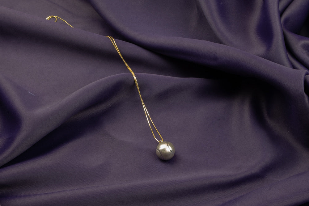 ‘Soothing Magic Ringing Ball’ Necklace