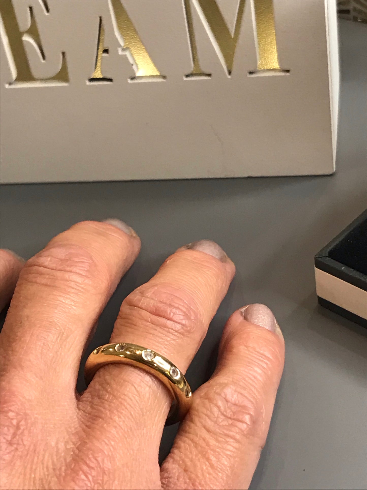 'Fake it till you make it' Gold Half Eternity Ring